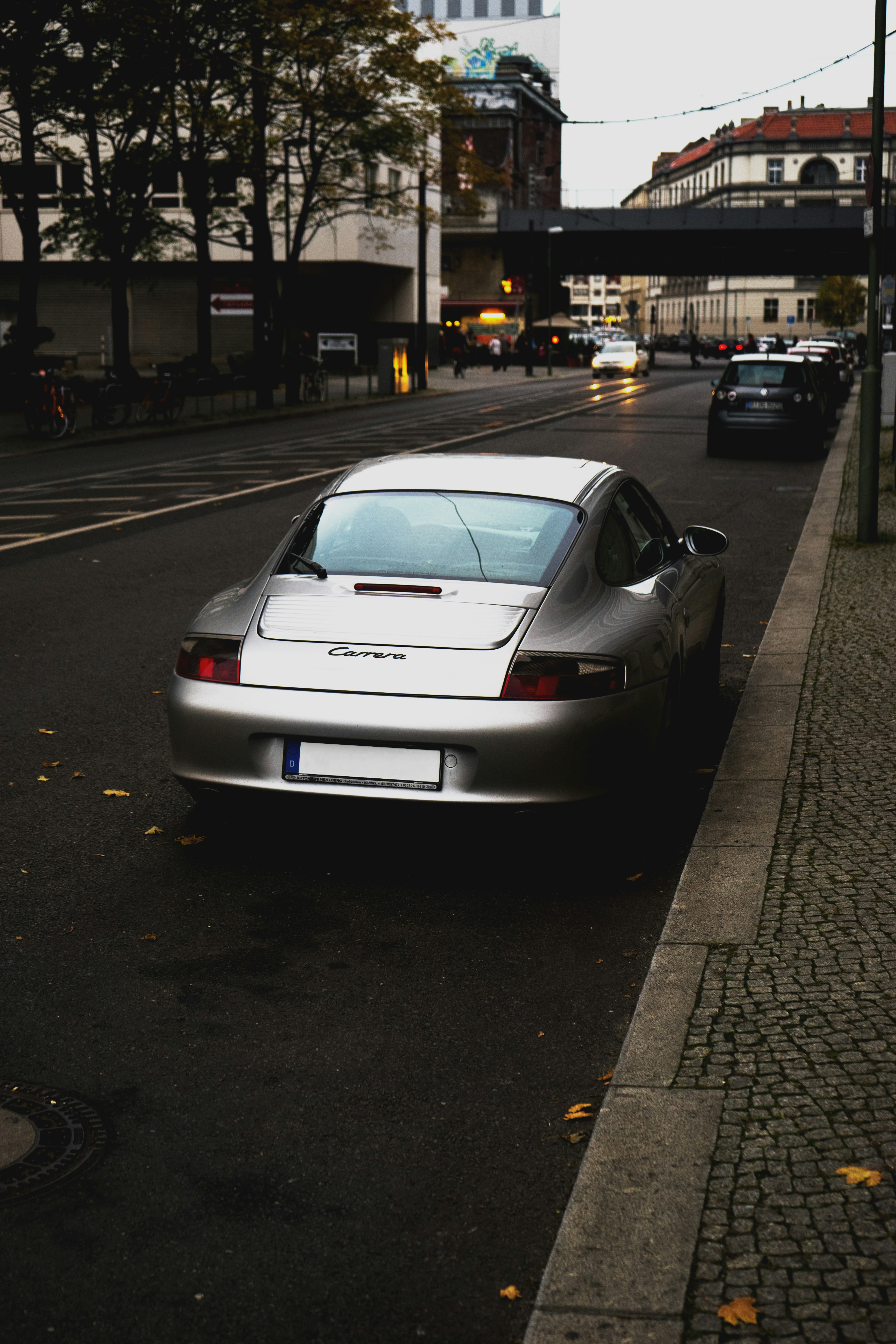 silver coupe parking